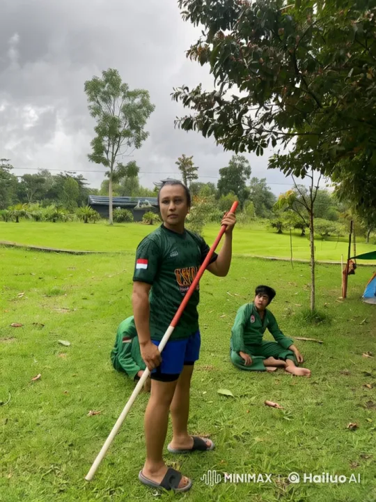 Kung Fu Master Displays Skills in Lush Outdoor Setting – AI Generated Video | Hailuo AI