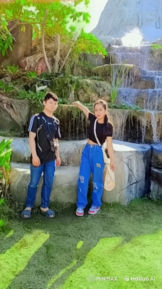 Tranquil Outdoor Scene with Animated Characters and Waterfall – AI Generated Video | Hailuo AI