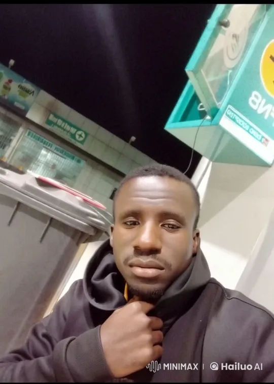 Nighttime Hoodie-Wearing Figure at Gas Station – AI Generated Video | Hailuo AI