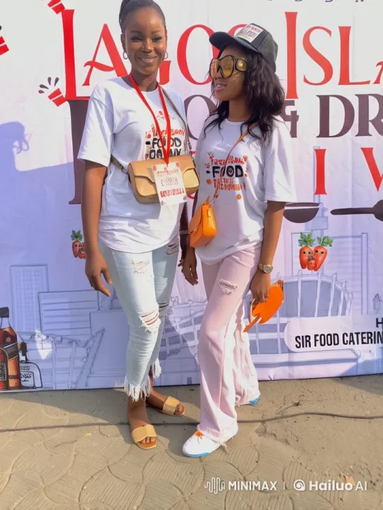 Lagos Island Food Festival: Two Friends Enjoying the Event – AI Generated Video | Hailuo AI