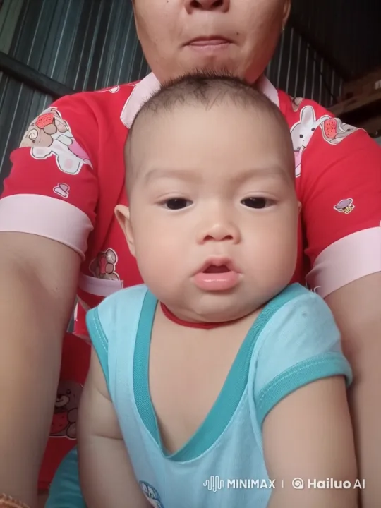 Baby in Blue Clothing Performs Kung Fu with Support – AI Generated Video | Hailuo AI