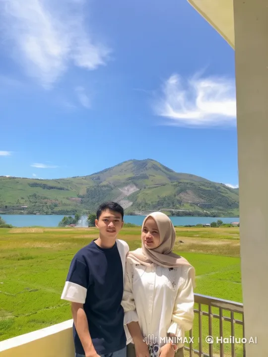 Couple Performing Kungfu in Scenic Balcony Setting – AI Generated Video | Hailuo AI