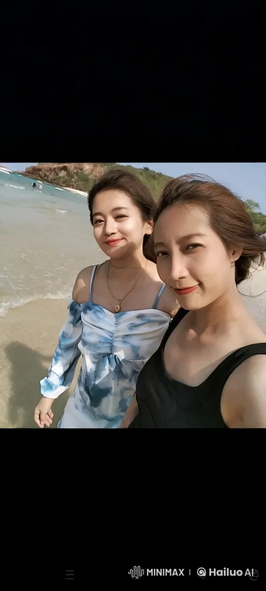 Two Women Enjoying a Serene Beach Walk – AI Generated Video | Hailuo AI