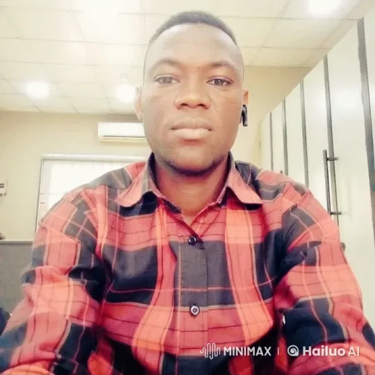 Calm Office Ambiance with Person in Plaid Shirt – AI Generated Video | Hailuo AI