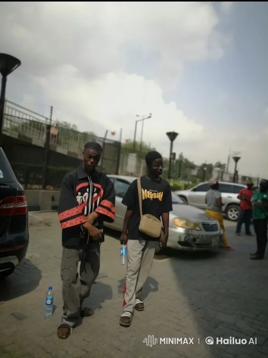 Kung Fu Practitioners Demonstrate Skills in Parking Lot – AI Generated Video | Hailuo AI