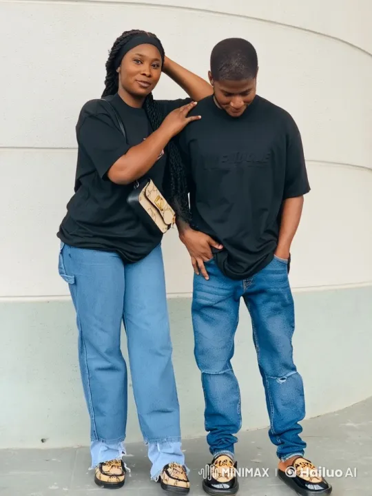 Two Friends Chill in Casual Outfits Against Modern Wall – AI Generated Video | Hailuo AI