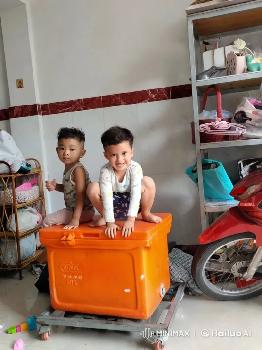 Boys Playfully Spar on Orange Container – AI Generated Video | Hailuo AI