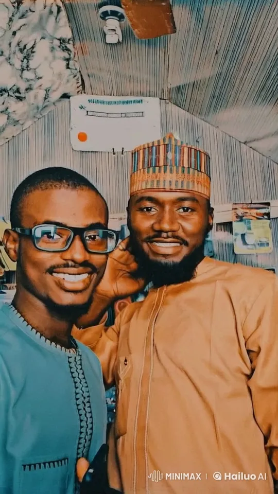 Two Men in Traditional Attire Playfully Tussle in Humorous Video – AI Generated Video | Hailuo AI