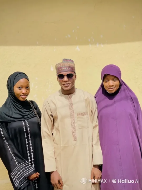 Three People in Traditional Attire Standing in Sunlight – AI Generated Video | Hailuo AI
