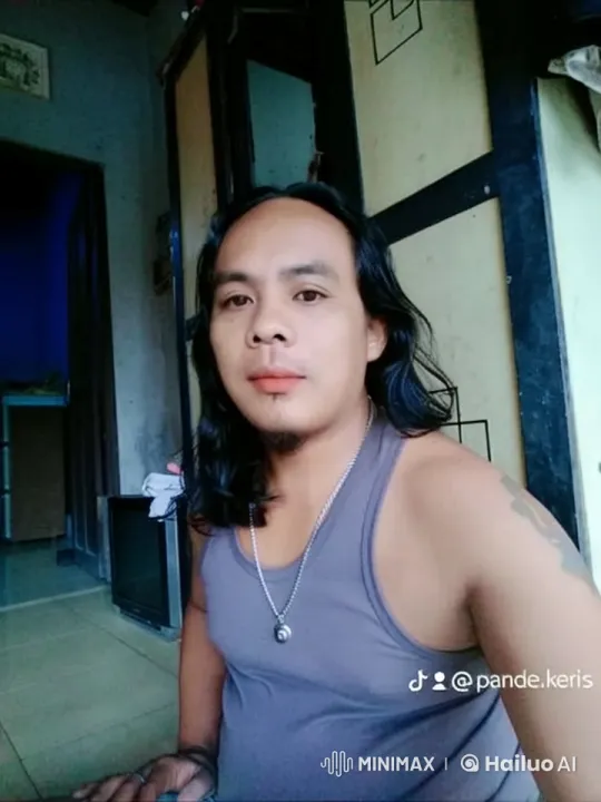 Live2D Animation of a Person in a Casual Living Space – AI Generated Video | Hailuo AI