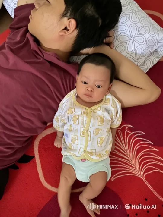 Baby and Adult Enjoy Playful Kungfu on Red Carpet – AI Generated Video | Hailuo AI