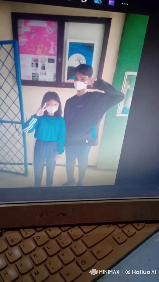 Two Individuals Embrace in Colorful Poster Setting – AI Generated Video | Hailuo AI