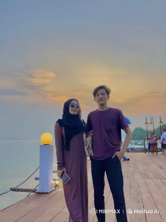 Couple's Martial Arts Display on Wooden Deck at Sunset – AI Generated Video | Hailuo AI