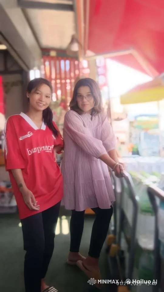 Marketplace Chat: Two Women in Colorful Attire – AI Generated Video | Hailuo AI