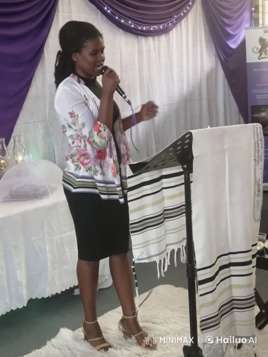 Woman Delivers Speech at Elegant Podium Event – AI Generated Video | Hailuo AI