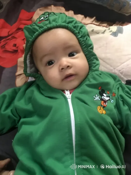 Baby in Green Hoodie Performs Kung Fu in Live2D Animation – AI Generated Video | Hailuo AI