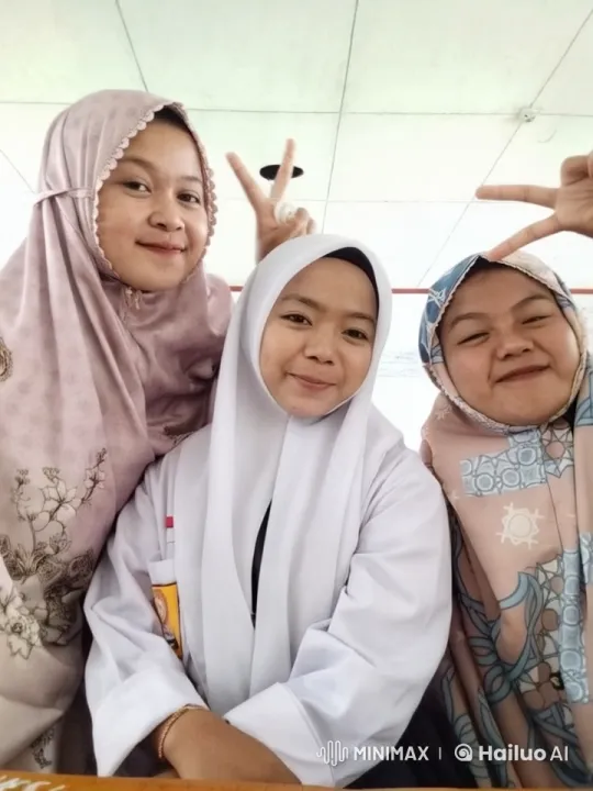 Three Women in Hijabs Posed Cheerfully Indoors – AI Generated Video | Hailuo AI