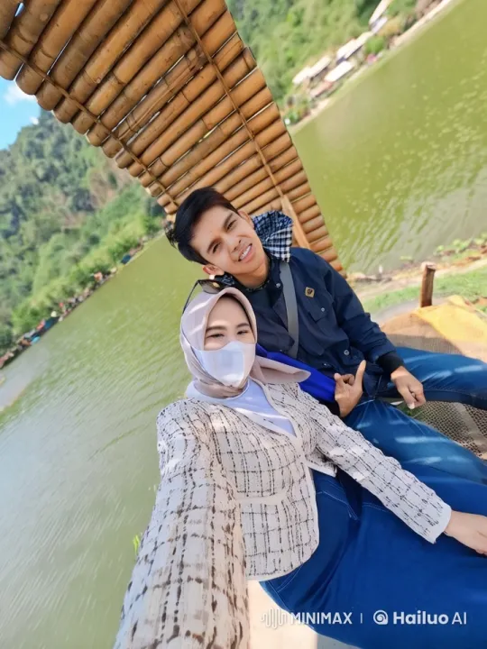 Casual Couple Showcases Dynamic Kungfu Against Serene River Background – AI Generated Video | Hailuo AI