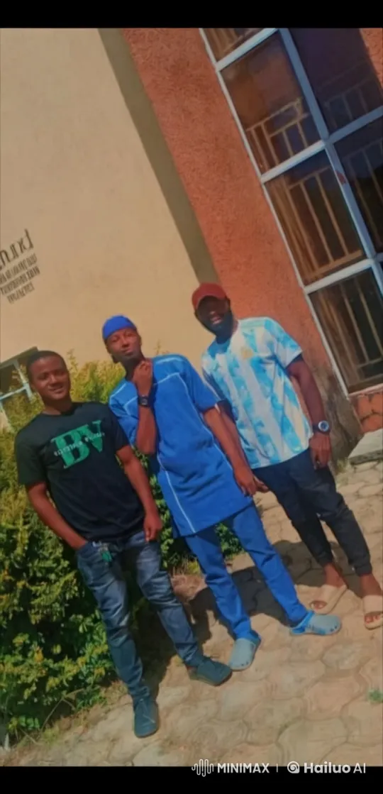 Three friends engage in playful martial arts outside a building. – AI Generated Video | Hailuo AI