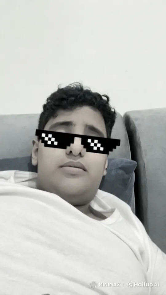 Relaxed Person Smoking on Couch in Live2D Animation – AI Generated Video | Hailuo AI