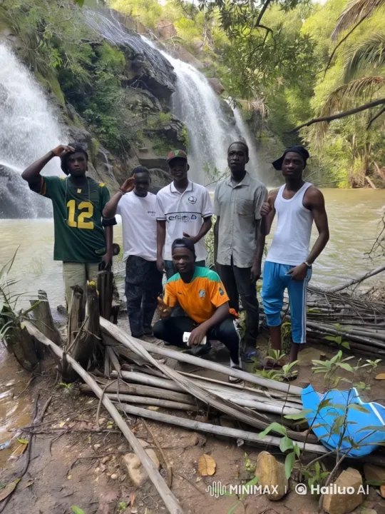 Friends Display Playful Kung Fu Near Waterfall – AI Generated Video | Hailuo AI