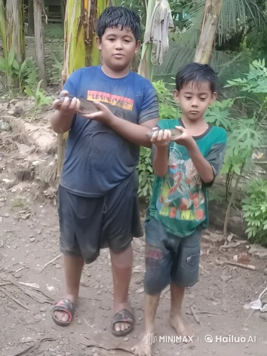 Boys Joyfully Display Their Fish Catch – AI Generated Video | Hailuo AI
