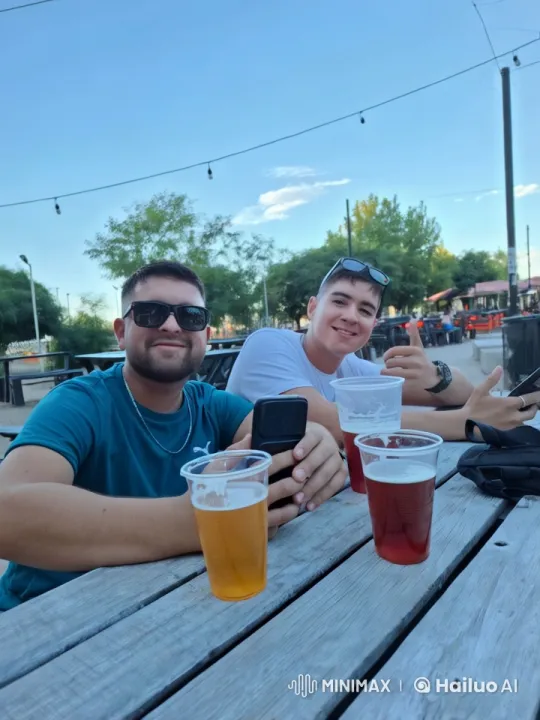 Boys Share Kiss Amid Outdoor Beer and Nature – AI Generated Video | Hailuo AI