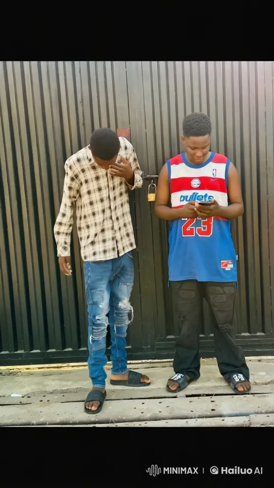 Young Men in Casual Streetwear at Metal Gate – AI Generated Video | Hailuo AI