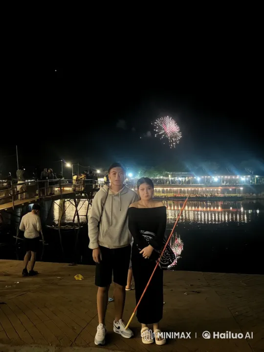 Couple Fights with Kungfu by Nighttime Lake with Fireworks – AI Generated Video | Hailuo AI