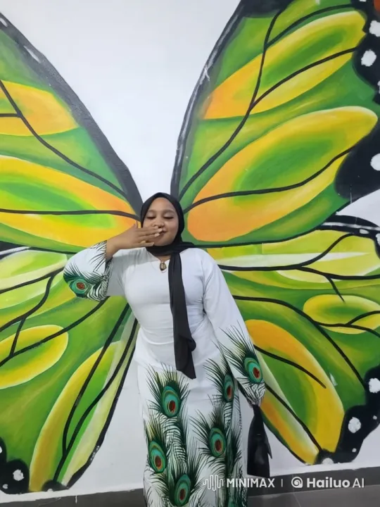 Woman Showcases Dynamic Kung-Fu Moves in Vivid Butterfly Mural Setting – AI Generated Video | Hailuo AI