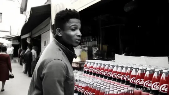 Young Man on a Mission in Bustling Market – AI Generated Video | Hailuo AI