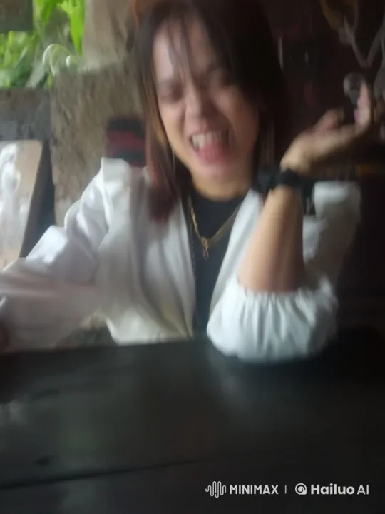 Casual Person Discussing at Rustic Table with Live2D Animation – AI Generated Video | Hailuo AI