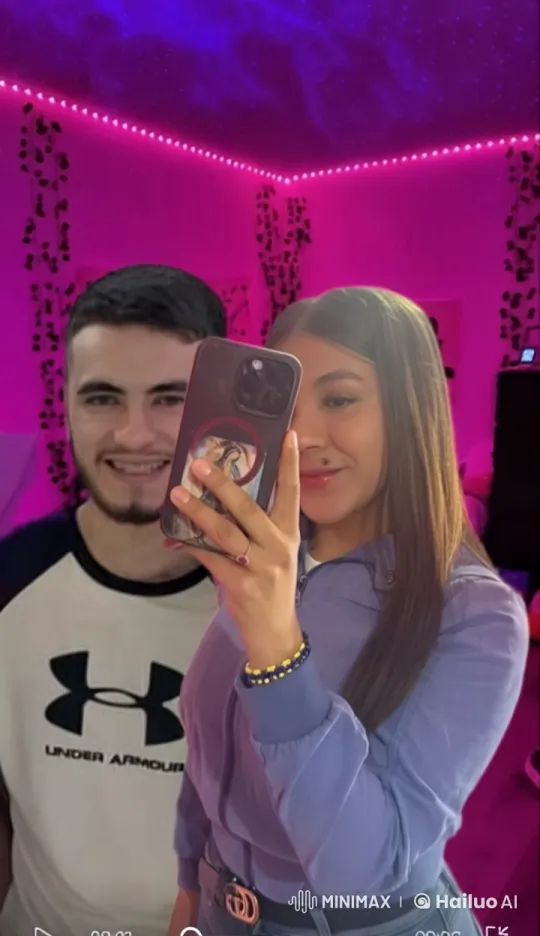 Intimate Moment of Boy and Girl in Purple-Lit Room – AI Generated Video | Hailuo AI