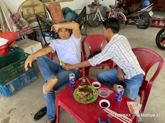 Casual Men Chatting in a Garage with Leftover Food and Beer – AI Generated Video | Hailuo AI