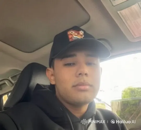 Affectionate Moment Between Two Men in a Car – AI Generated Video | Hailuo AI