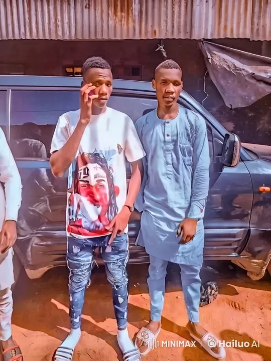 Young Men Standing by Car, Interacting Naturally – AI Generated Video | Hailuo AI