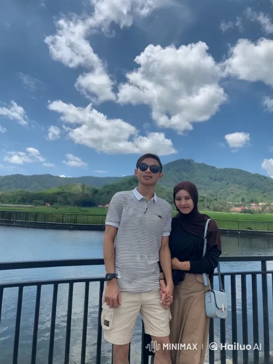 Couple Practicing Kungfu on Scenic Bridge – AI Generated Video | Hailuo AI