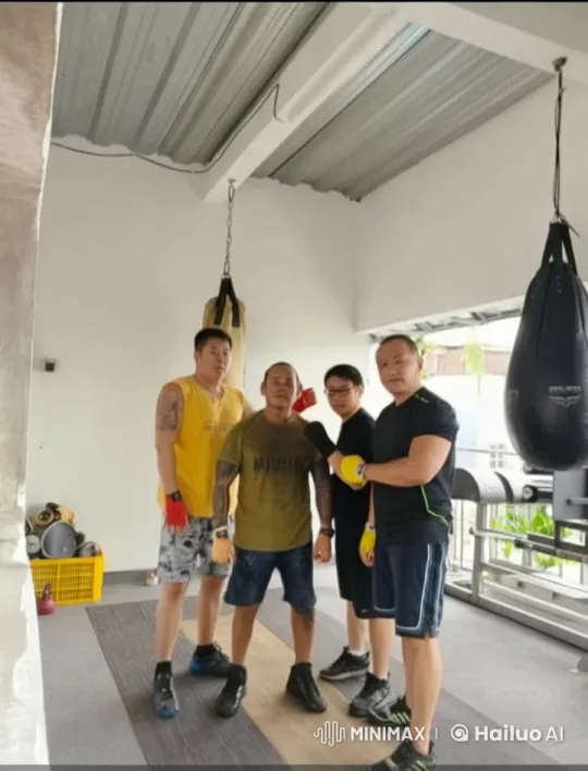 Four Men Practice Kungfu in a Gym Setting – AI Generated Video | Hailuo AI