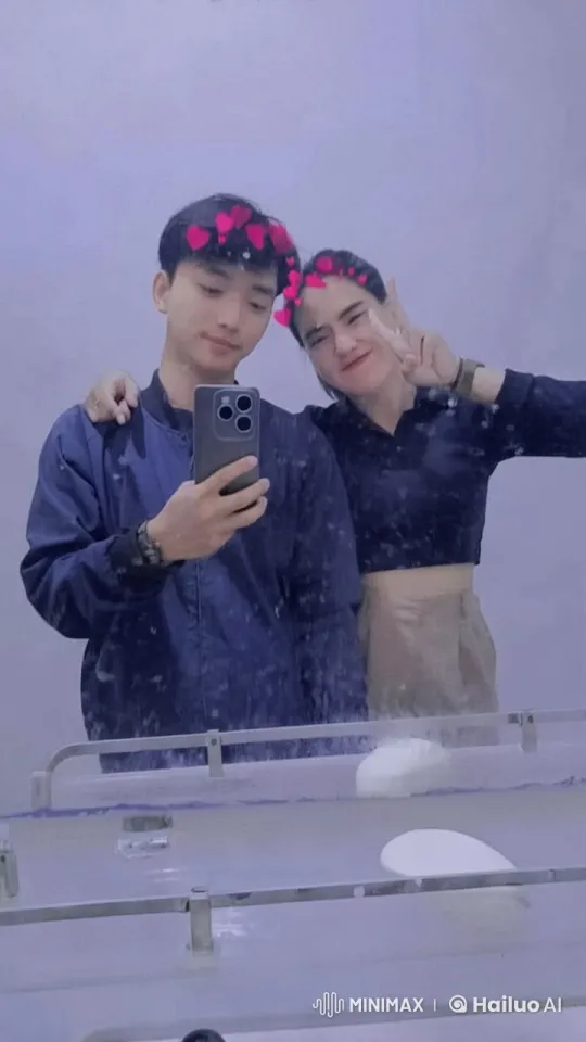 Couple Playfully Mock-Fighting in Front of Mirror – AI Generated Video | Hailuo AI