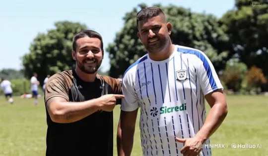 Two Men Enjoying a Playful Moment on a Sunny Soccer Field – AI Generated Video | Hailuo AI