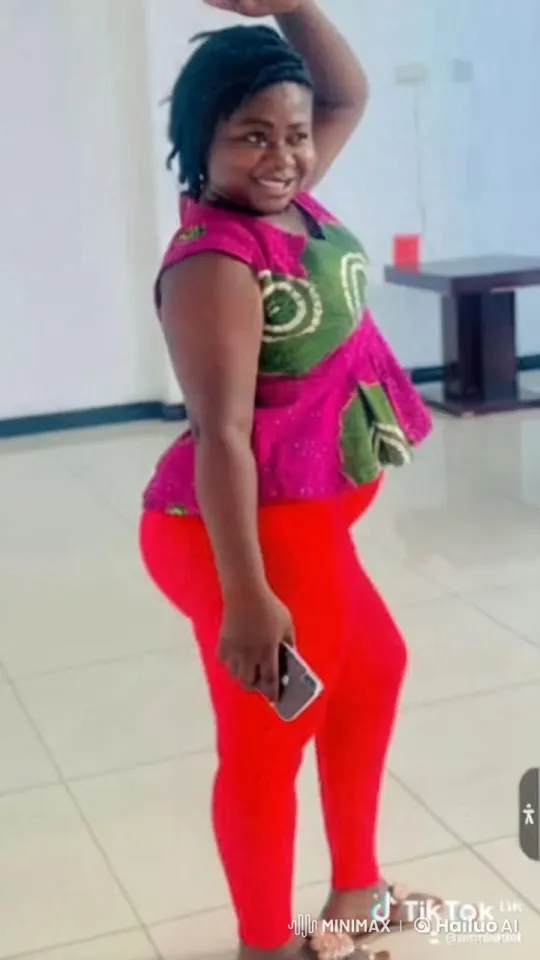 Confident Woman in Colorful Outfit with Smartphone – AI Generated Video | Hailuo AI
