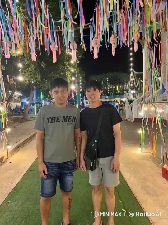 Festive Night: Two Men Playfully Practicing Kung Fu – AI Generated Video | Hailuo AI