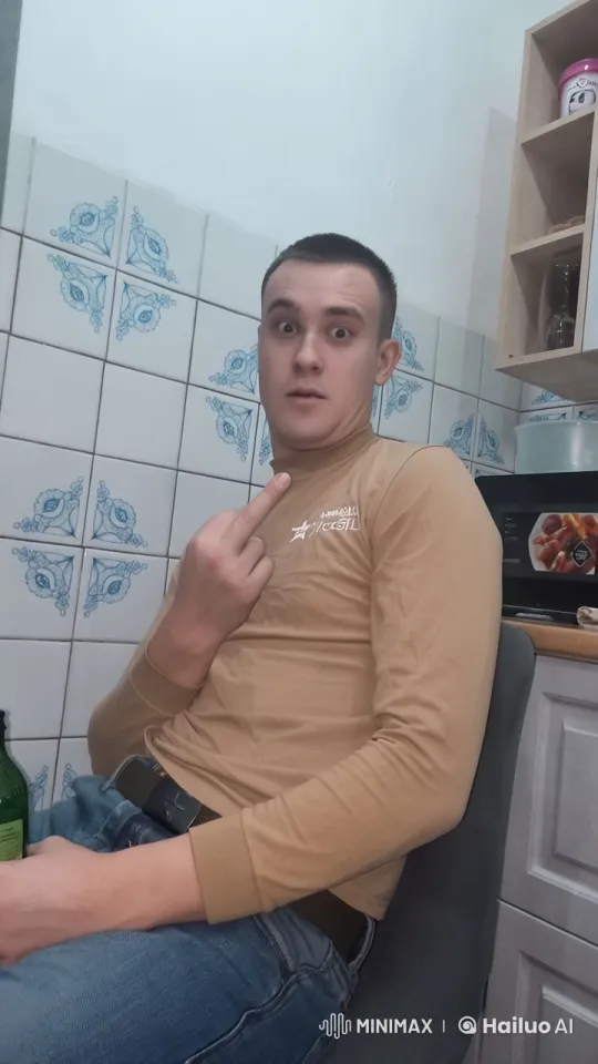 Casual Smoking and Shooting Scene in Blue Kitchen – AI Generated Video | Hailuo AI