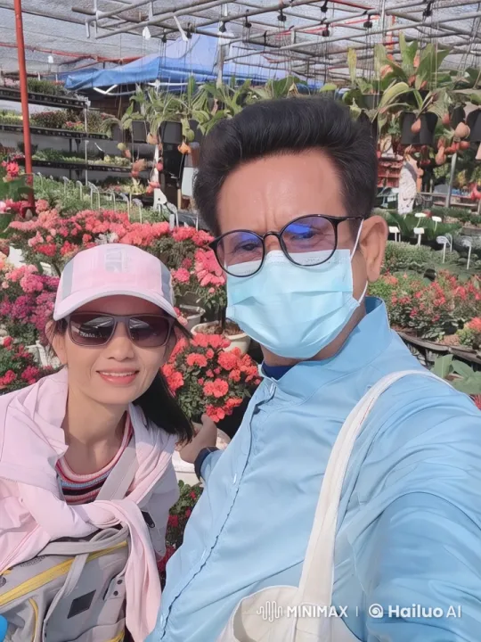Vibrant Garden Setting with Two Individuals – AI Generated Video | Hailuo AI