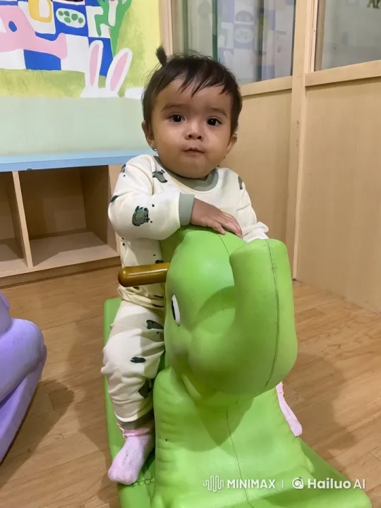 Toddler Practices Kung Fu on Elephant Rocker in Playroom – AI Generated Video | Hailuo AI