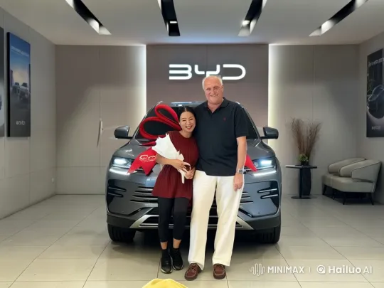 Couple Showcases Martial Arts in Stylish BYD Showroom – AI Generated Video | Hailuo AI