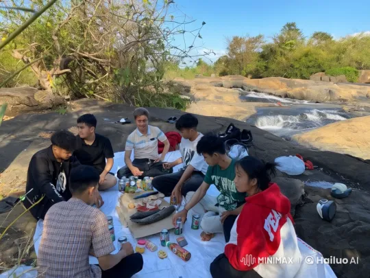 Friends Enjoy Picnic, Engage in Friendly Kung Fu by Waterfall – AI Generated Video | Hailuo AI
