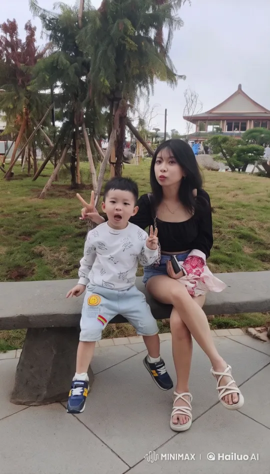 Child Practices Kung Fu in Park with Mother's Encouragement – AI Generated Video | Hailuo AI