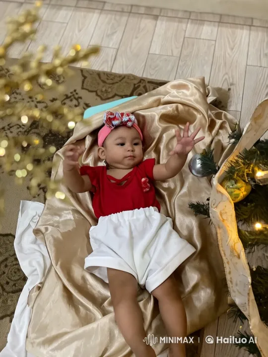 Baby Performing Playful Kungfu in Festive Holiday Setting – AI Generated Video | Hailuo AI