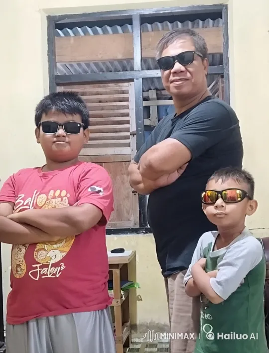 Man and Two Boys Prepare for Playful Fight – AI Generated Video | Hailuo AI